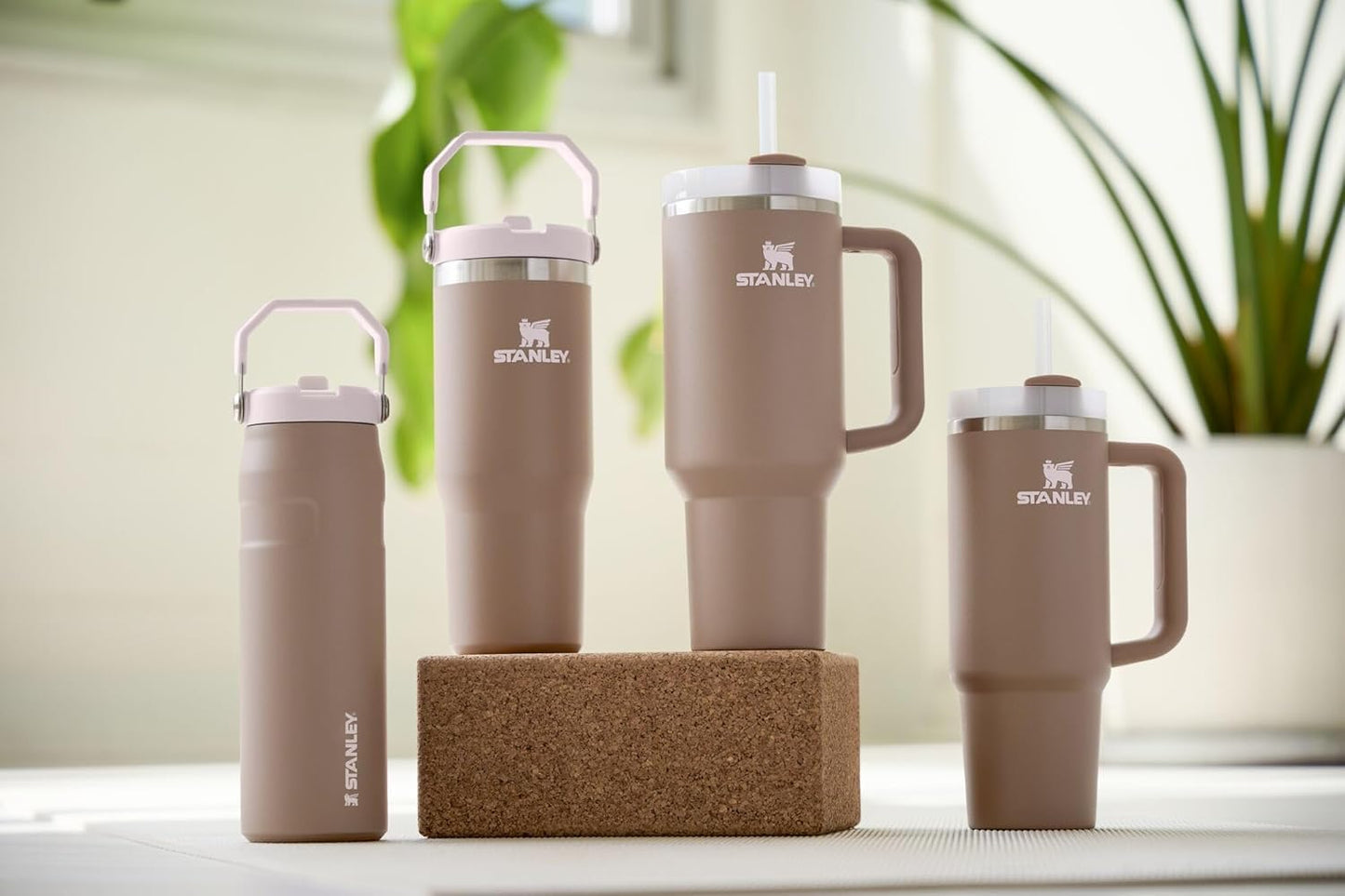 STANLEY Quencher H2.0 Tumbler with Handle and Straw 40 oz | Flowstate 3-Position Lid | Cup Holder Compatible for Travel | Insulated Stainless Steel Cup | BPA-Free | Almond Rose