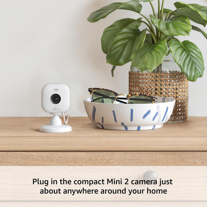 Blink Outdoor 4 + Mini 2 – Wireless smart security camera, two-year battery life, 1080p HD day and infrared night live view. Sync Module Core included – 3 camera system + Mini 2 (Black)