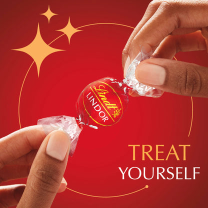Lindt LINDOR Milk Chocolate Candy Truffles, Milk Chocolate with Smooth, Melting Truffle Center, 25.4 oz., 60 Count
