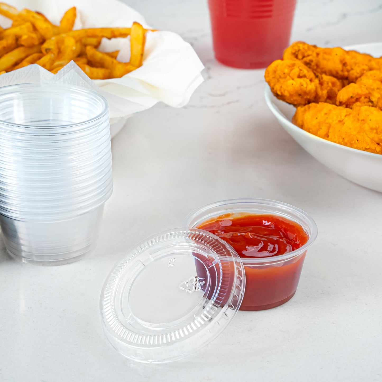 Amazon Basics Disposable Plastic To-Go Cups and Lids, Mini, 2oz, 50 Count