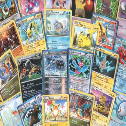 100 Assorted Pokemon Trading Cards with 7 Bonus Free Holo Foils